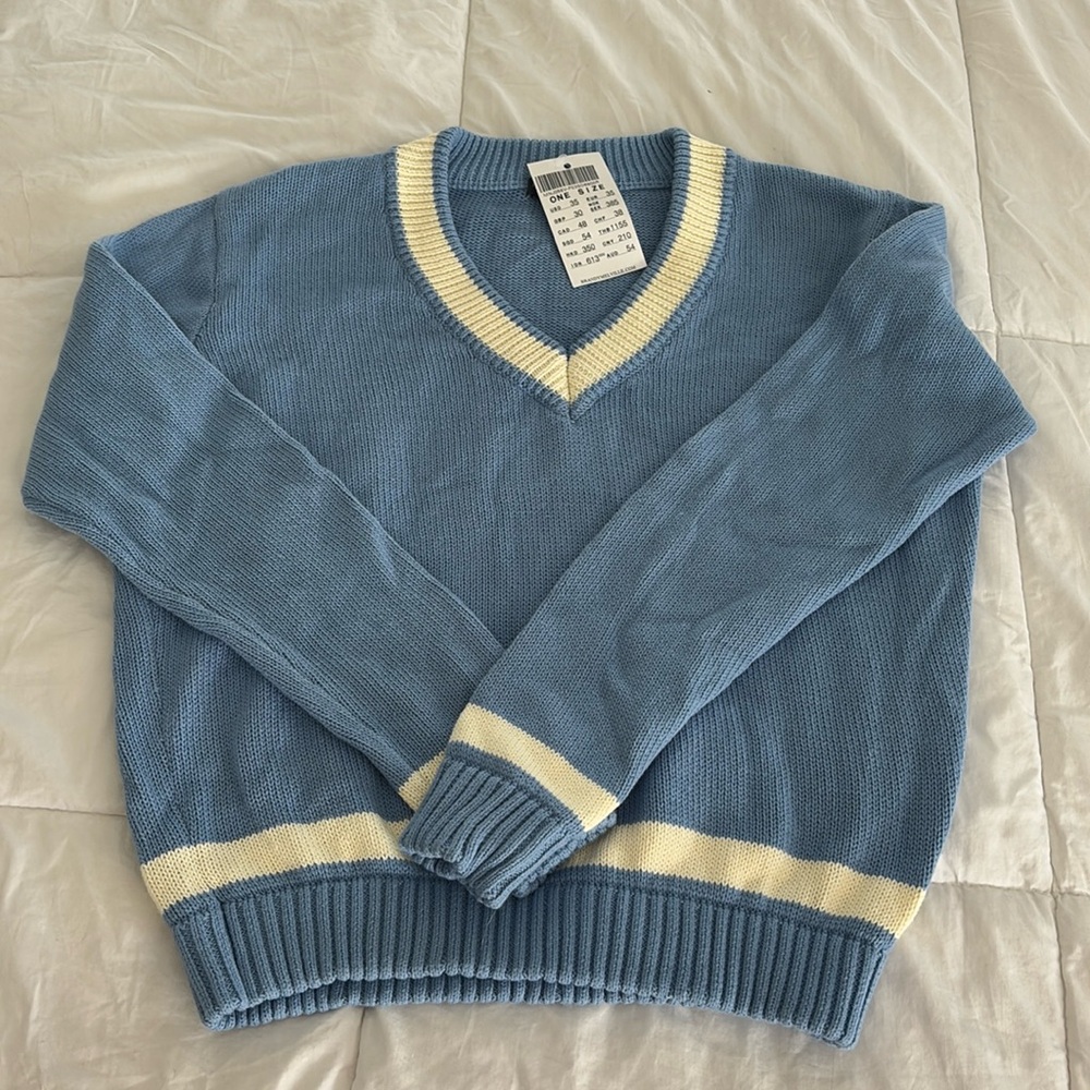 Blue/White Vneck Sweater (hard to find) in excellent condition. Smoke free home.